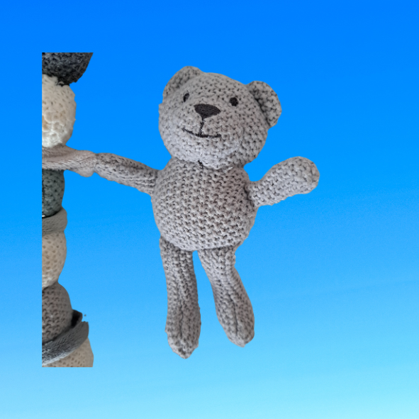 Prénatal Kinderwagenkette Buddy und Poppy aus Strick
