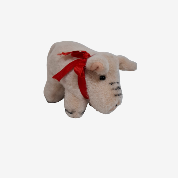 Schwein mit roter Schleife