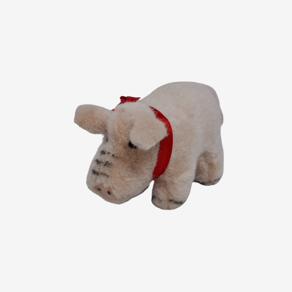 Schwein mit roter Schleife